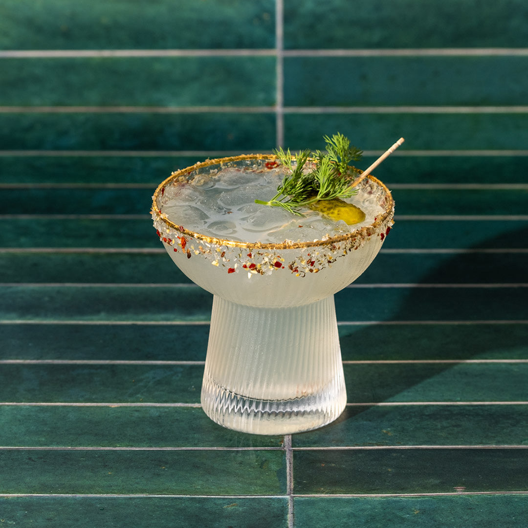 Dill Pickle Sea Salt rimming a pickle and lime margarita