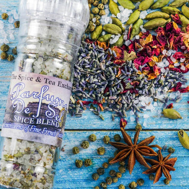 Parfume de Sel Spice Blend on background with cardamom seeds, lavender, rose, star anise