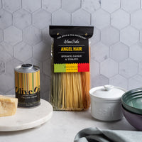 Rainbow Angel Hair Pasta - Spinach, Garlic & Tomato in 12 oz packaging